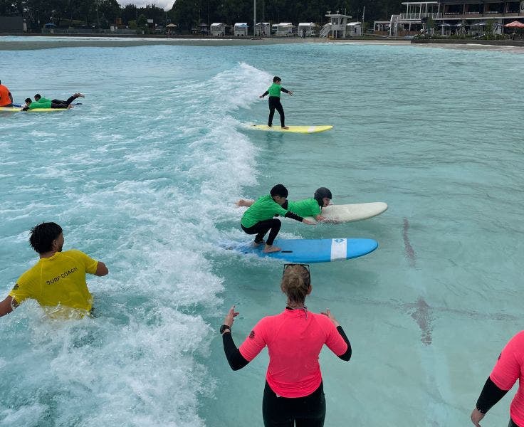 Students having a try at surfing